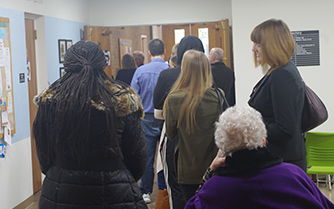 Voters stand in line to vote at Mt. Zion United Methodist Church. Voters there said lines were longer than expected that afternoon but moved fairly quickly.
