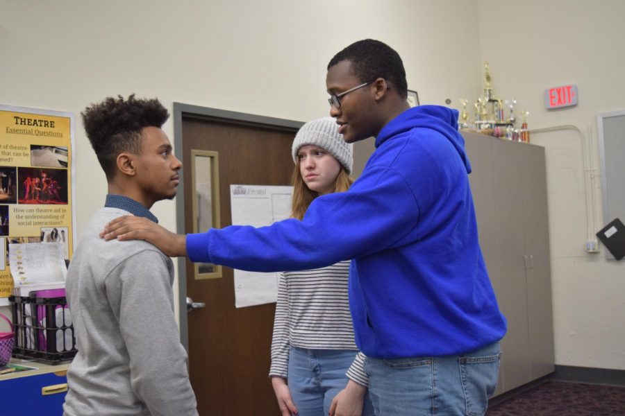 Juniors Cassie Schoene, Javon Spearman, and Rome Little rehearse together after school. “Come see the show, because I really feel like this is a little different from something that we’d usually do… I think it’s going to be a really good show,” said Schoene.