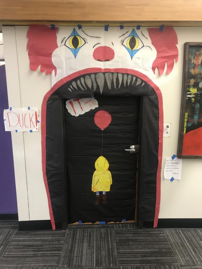 
With Halloween festivities coming to an end, Parkway North showed their spirit by competing in an annual door decorating competition. There were many competitors with creative door designs; however, Scott Nilsen’s junior ac lab won with a design inspired by the scary movie “IT.” Released on Sept. 16, 2019, the new “IT 2” movie inspired students to recreate the clown “Pennywise” as their door decoration. “It is cool to be apart of helping put the design together and actually winning, “IT” is also one of my favorite movies so that was nice as well,” said junior Eric McDaniels, who helped design the door. 

