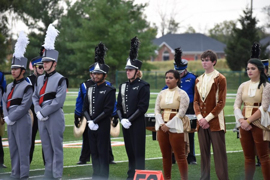 Drum majors junior Keith Pennel and senior Logan Boatright wait for results at the Potosi Band Competition on Oct. 12, 2019. Pennel and Boatright will be presenting the trivia night.