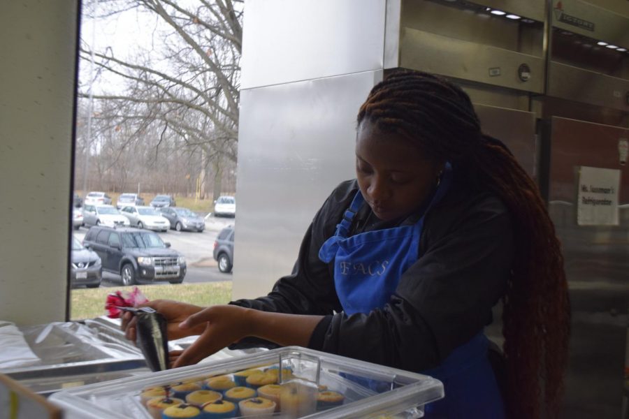 Junior Zion Lewis ices cupcakes for her team in North’s first ProStart 3 Cupcake Wars on Jan. 31.Winners will be announced on Tuesday, Feb. 4.
