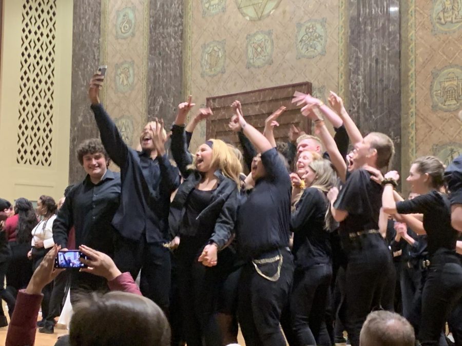 North A Capella celebrates after their second place win at Quarterfinals on Feb. 7, allowing them to move on Semifinals on March 14. Honestly, we gave everything we had to the performance. In my opinion, if you don’t walk off a stage with a high, then you haven’t truly performed, said Mueller.