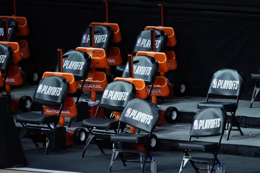 The Milwaukee Bucks bench remains empty after the scheduled start of game five against the Orlando Magic in the first round of the 2020 NBA Playoffs on August 26, 2020 at AdventHealth Arena at ESPN Wide World Of Sports Complex in Lake Buena Vista, Florida. The Bucks boycotted their game 5 playoff game against the Orlando Magic to protest the shooting of Jacob Blake by Kenosha, Wisconsin police. (Ashley Landis/Pool/Getty Images/TNS)