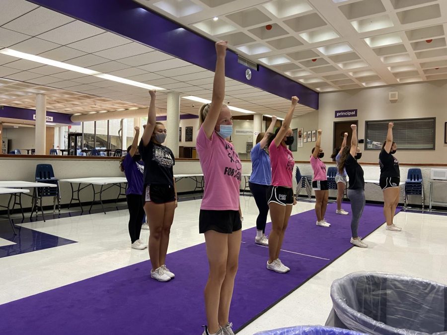 After school, varsity cheer rehearses their choreography in preparation for football games, pep rallies and Homecoming. During home games, cheer, color guard, the Vikettes and marching band perform in the commons that morning, a tradition just returning to North with the pandemic.