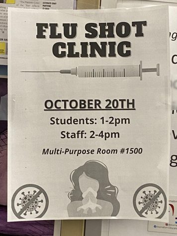 Flyers are posted around the school providing information on the flu shot drive happening on October 20.