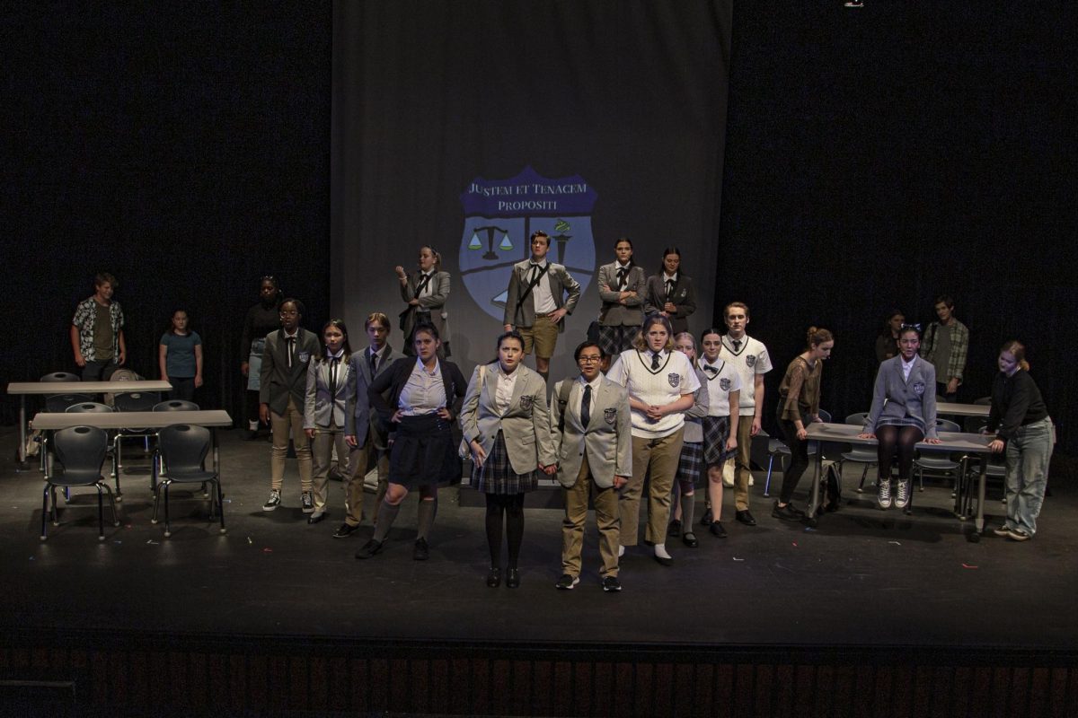 To introduce the audience to the setting and the characters of Ranked, the district high school musical, the cast performs the opening scene. Thirty students from all four high schools performed the musical on two separate weekends at both North High and West High.