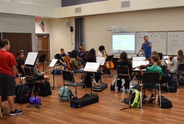 Adam Wheeler leads Concert Orchestra 1 students while they practice on Sept 19. Wheeler started working at Parkway North this year after Ken Rapini retired from teaching.