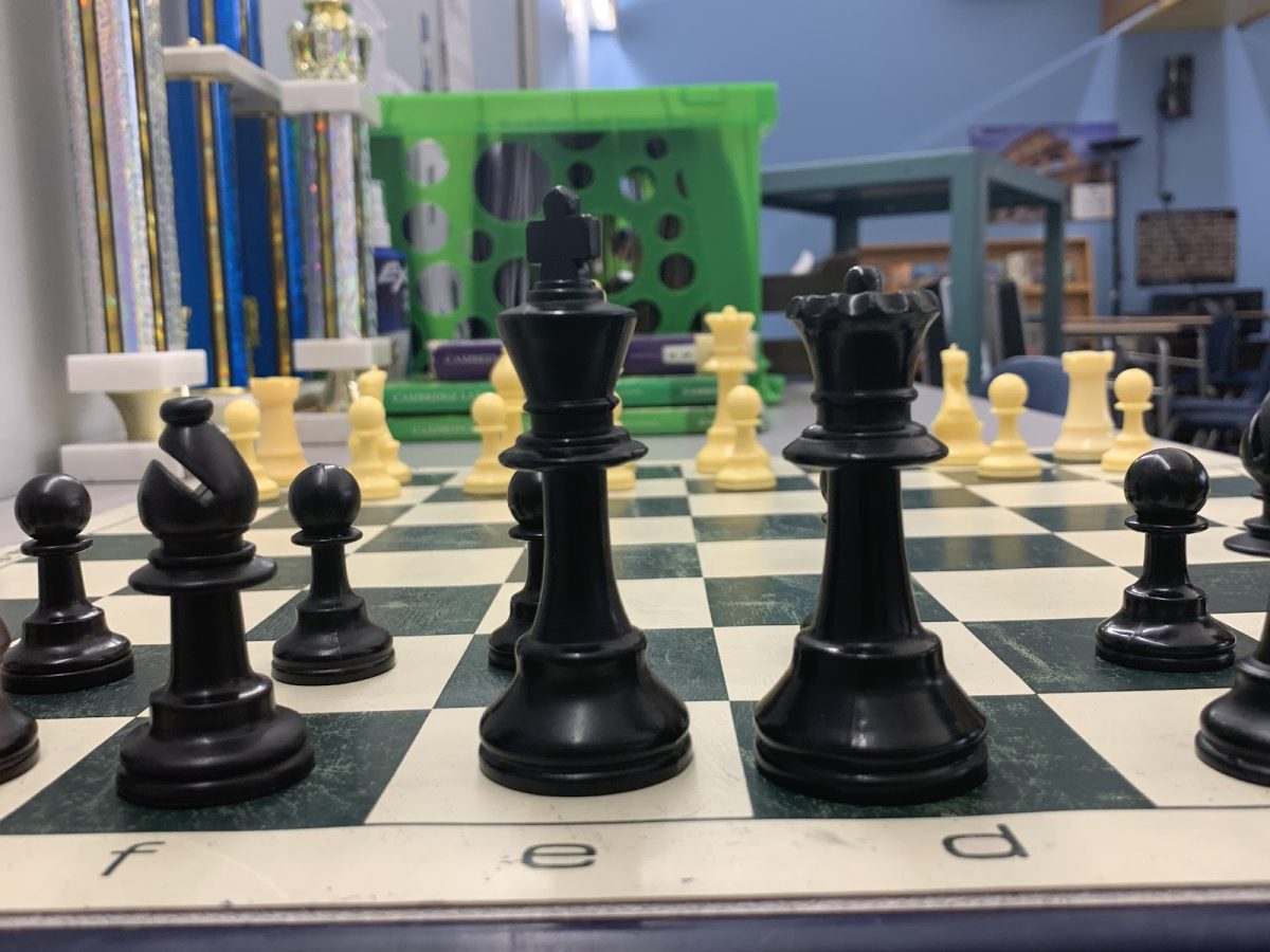 A chess board sits ready in Stiller's room for the next participants to join. Students meet in Stiller's room on Wednesdays after school to play and learn about chess during Chess Club.