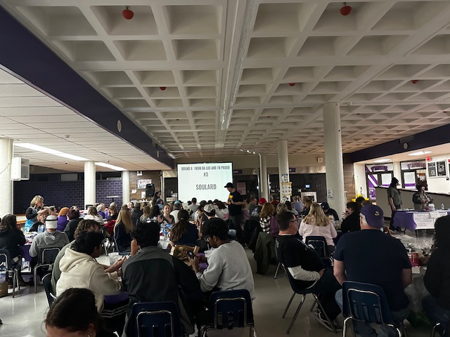 Students and parents sit around tables in the Commons Area of Parkway North taking part in Trivia Night. As they wait for the answers to be given, a bonus competition is announced, calling for participation for one dollar. All proceeds went to support the Senior Bash.