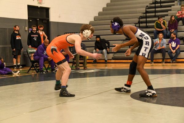  Freshman Markell Kimmins wrestles an opponent from Webster Groves High School on Jan. 3. This was one of a few meets Kimmins attended before he injured his knee and was out for the season.
