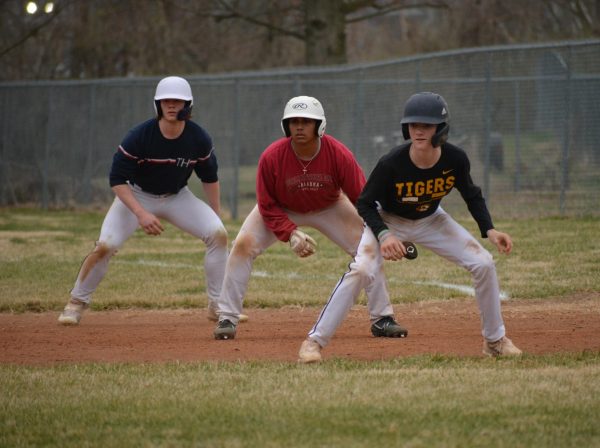 Sophomore John Knehans and juniors Samuel Thomas and Jackson Madison run drills during a practice session. The team meets frequently to prepare for their games which begin March 15.