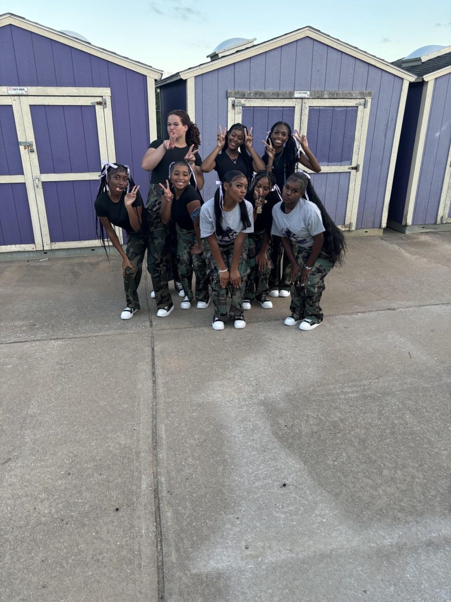 The Parkway North dance team poses outside the school before performing. The dance team performs at football and basketball games as well as other events like pep rallies.