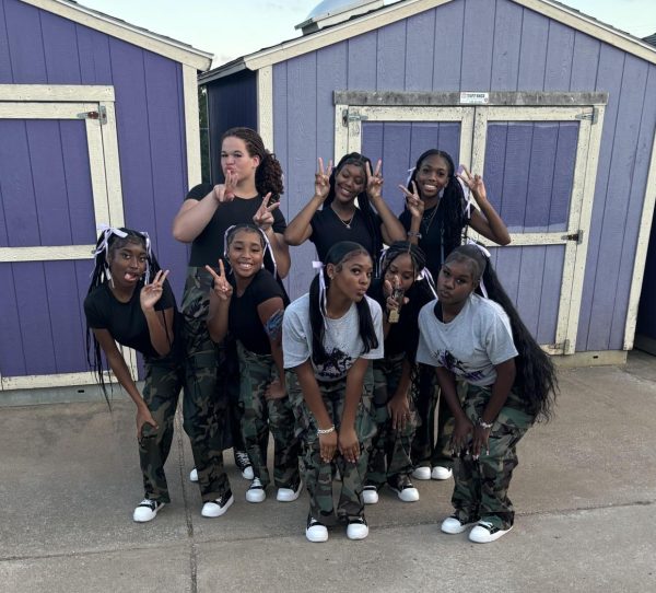 The Parkway North dance team poses outside the school before performing. The dance team performs at football and basketball games as well as other events like pep rallies.