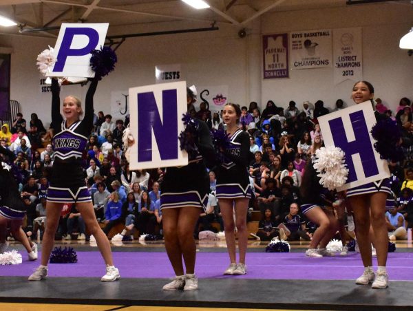 JV cheerleaders get the crowd riled up by including them in their routine chant. It was a great way to get students ready for the homecoming football game and dance that weekend.