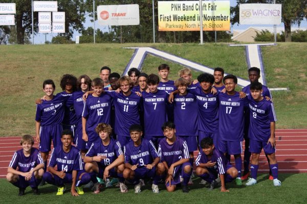 The varsity boys soccer team poses  after their first game against Pattonville on Sept. 3. Many of the others competed together on the team last year. Photo by Leila Deskins 