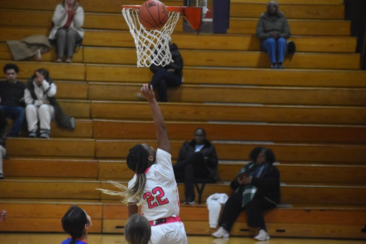 Smith shoots a layup for two points after Omuno passed her the ball. The game ended with a score of 69-52, adding a win for the Vikings.