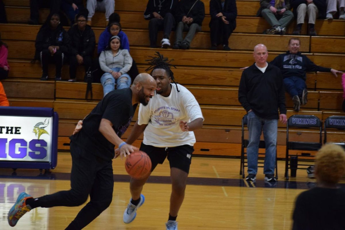 Senior Martez Blair found himself playing defense against the opponent in the Student vs. Staff game. “Coach Hardy didn’t score because of my defense, and I was like the best player on my team,” Blair said. 