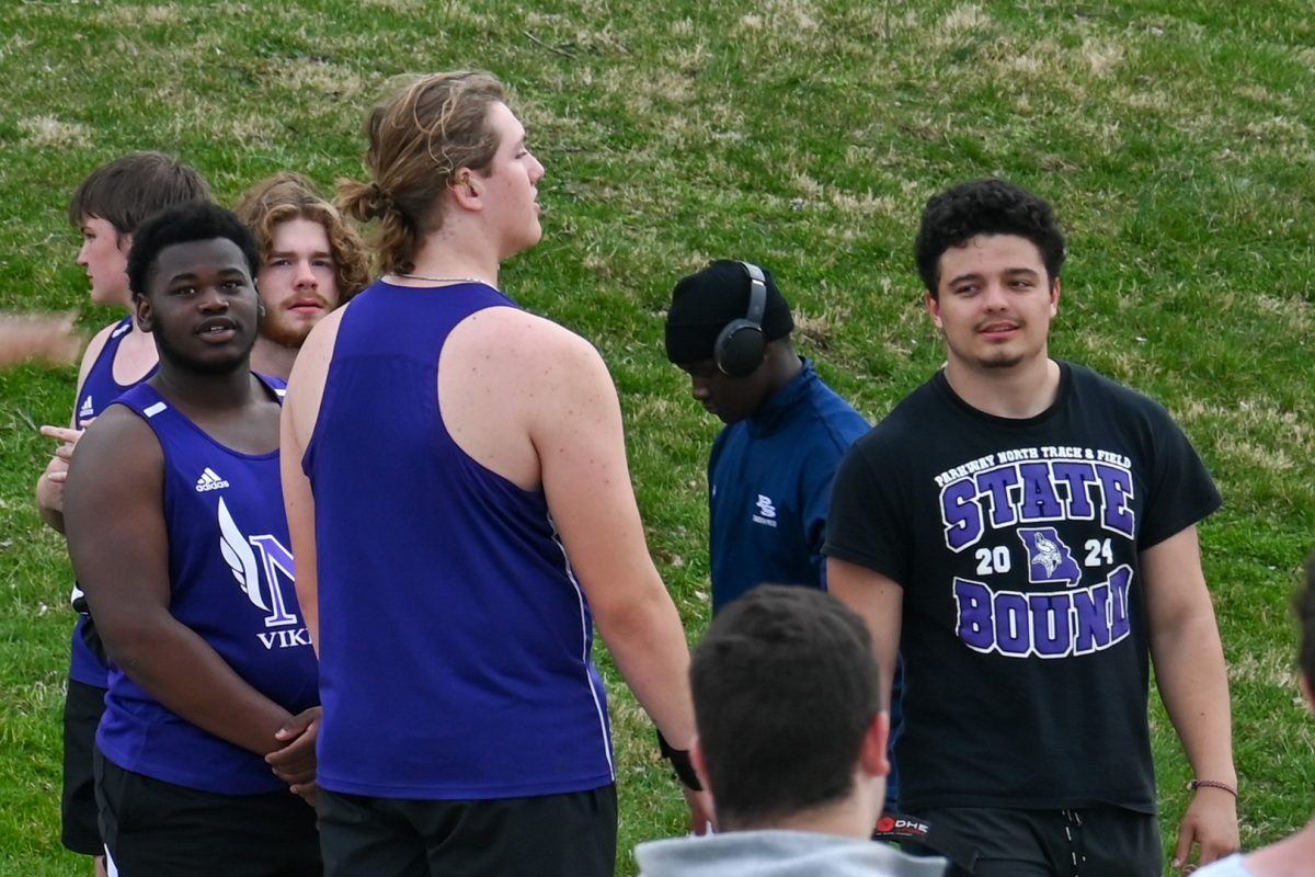 Paul and Goldman wait on the side of the throwing circle to compete at the March 28 meet. Both Goldman and Paul are ranked in the top five for discus throwing in Missouri state class 4.